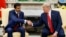 President Donald Trump shakes hands with Qatar's Emir Sheikh Tamim Bin Hamad Al-Thani in the Oval Office of the White House, Tuesday, July 9, 2019, in Washington. (AP Photo/Evan Vucci)