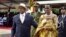 FILE - Uganda's longtime president Yoweri Museveni, 71, left, and his wife Janet Museveni, right, attend his last inauguration ceremony in the capital Kampala, May 12, 2016. 