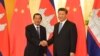 FILE - Cambodia’s Prime Minister Hun Sen shakes hands with China's President Xi Jinping before their meeting at the Great Hall of the People in Beijing, China April 29, 2019. (Madoka Ikegami/Pool via REUTERS) 