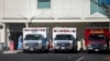 Ambulances are seen outside of St. Francis Medical Center emergency room during a surge of coronavirus disease (COVID-19) cases in Los Angeles, California, Dec. 26, 2020. 