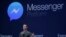 脸书CEO扎克伯格在旧金山召开的脸书开发者大会上介绍即时通讯软件Messenger。(2015年3月25日)