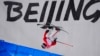China's He Binghan competes during the men's halfpipe qualification at the 2022 Winter Olympics, Feb. 17, 2022, in Zhangjiakou, China. 