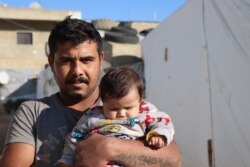 Mahmoud and his neighbors say their houses have been destroyed, and even if they felt it was safe to return to Syria, they have no money to re-settle on Dec. 3, 2019 in the Bekkaa Valley in Lebanon. (Heather Murdock/VOA)