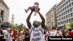 Protest against racial inequality in the aftermath of the death in Minneapolis police custody of George Floyd, in Washington