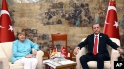 Angela Merkel et Recep Tayyip Erdogan en Chine, le 4 septembre 2016, en marge d'un sommet du G-20 à Hangzhou. 