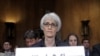 Undersecretary of State for Political Affairs Wendy R. Sherman prepares to testify on Capitol Hill in Washington, Dec. 1, 2011. 