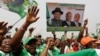 Supporters of Nigeria President Goodluck Jonathan, sing slogans, during an election campaign rally, at Tafawa Balewa Square in Lagos, Nigeria, Thursday, Jan. 8, 2015.