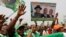 Supporters of Nigeria President Goodluck Jonathan, sing slogans, during an election campaign rally, at Tafawa Balewa Square in Lagos, Nigeria, Thursday, Jan. 8, 2015.