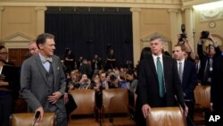 Top U.S. diplomat in Ukraine William Taylor, and career Foreign Service officer George Kent, left, arrive to testify before the House Intelligence Committee on Capitol Hill in Washington.