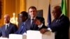 Presiden Prancis Emmanuel Macron (kedua kanan), Presiden Senegal Macky Sall, dan Presiden Dewan Eropa Charles Michel (kiri) mendengarkan Presiden Ghana Nana Afuko Addo (kanan), dalam konferensi pers di Istana Elysee, Paris, 17 Februari 2022. (Ian Langsdon, Pool via AP)
