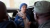 FILE - Liberia's President Ellen Johnson Sirleaf arrives at the Capitol to address lawmakers in Monrovia, Liberia.
