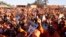 Supporters of Malawi's incumbent President cheer during her final campaign rally at Songani village on the outskirts of the city of Zomba, the former capital of Malawi, May 17, 2014. 