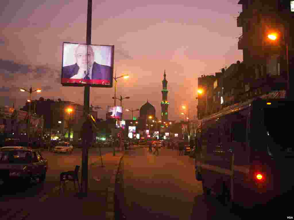 In Old Cairo, election advertisements failed to excite voters enough to come out in large numbers, Dec. 1, 2015. (Photo - H. Elrasam/VOA)
