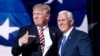 Republican presidential candidate Donald Trump, points toward Republican vice presidential candidate Indiana Gov. Mike Pence after Pence's acceptance speech during the third day session of the Republican National Convention in Cleveland.