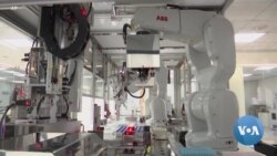 Robot Arms Perform Tests to Detect COVID-19 