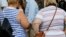 FILE: Two overweight women in New York. A new study predicts that half of all Americans will be obese by 2030.