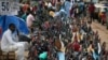 FILE - Bags are arranged for sale along a road at the Mokolo main market in Yaounde, the capital of Cameroon.