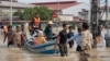 National Committee for Disaster personnel rescue people from floodwaters after heavy rainfall in Phnom Penh, Cambodia, October 15, 2020. (Malis Tum/VOA Khmer)