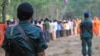 In this file photo, Cambodian armed police monitor last year's tree blessing ceremony in Prey Lang protected forest. (Courtesy photo of Licadho)