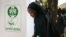 FILE - A woman casts her ballot during Nigeria's presidential election at a polling station in Kazaure, Jigawa state, Nigeria, Feb. 23, 2019. Nigerian election officials say they have recorded at least 42 attacks on its facilities since the 2019 polls. 