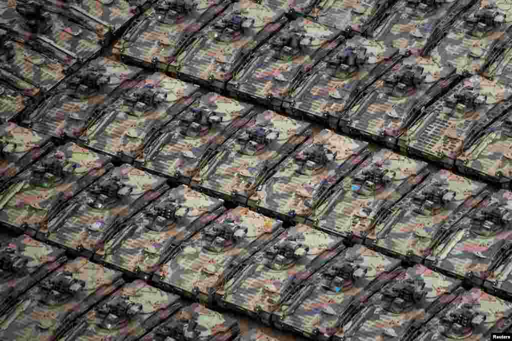An aerial view of decommissioned German-made Marder fighting vehicles in the compound of the Koch Battle Tank Dismantling firm in the eastern village of Rockensussra, some 300 km (186 miles) south west of Berlin.