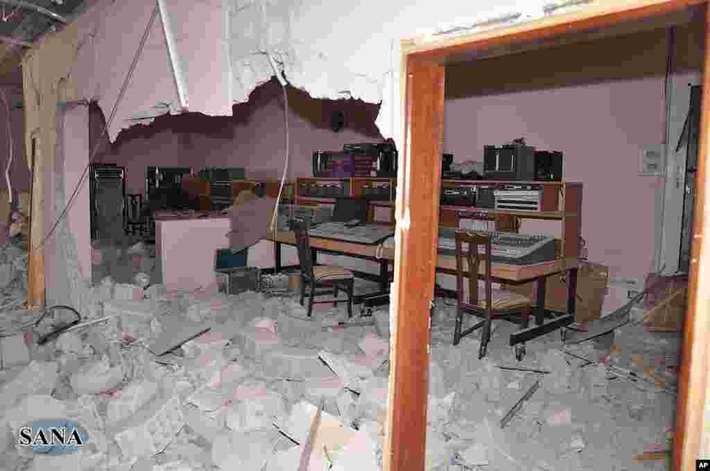 Damaged control room of al-Ikbariya TV station (photo released by the Syrian official news agency, SANA)