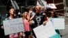 Demonstrators protest outside the Comcast Center in Philadelphia, July 27, 2016, during the third day of the Democratic National Convention. 
