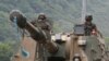 South Korean army soldiers ride a K-9 self-propelled howitzer during the annual exercise in Paju, South Korea, near the border with North Korea, June 23, 2020.
