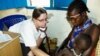 An MSF doctor examines a baby in Pibor town in South Sudan's Jonglei state in this 2012 file photo. 