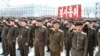 North Koreans attend a rally against the United States and South Korea in Nampo, April 3, 2013.