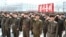 North Koreans attend a rally against the United States and South Korea in Nampo, April 3, 2013.
