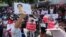 Demonstrators denounce the military coup in Myanmar, at a rally in Yangon, Feb. 9, 2021, calling for military leaders to be arrested. (VOA Burmese Service)