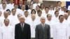 Cambodia's King Norodom Sihamoni, second right, poses for photograph altogether with Hun Sen, right, Cambodian Prime Minister, Chea Sim, second left, Cambodia Senate President, Heng Samrin, left, Cambodian National Assembly President, in front of the National Assembly in Phnom Penh, Cambodia, Wednesday, Sept. 24, 2008.