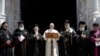 Pope Francis, center, flanked by Ecumenical Patriarch Bartholomew, left, Teodoro II, right, and other Orthodox patriarchs and Catholic leaders, reads his message outside the St. Nicholas Basilica on the occasion of a daylong prayer for peace in the Middle East in Bari, southern Italy, Saturday, July 7, 2018.