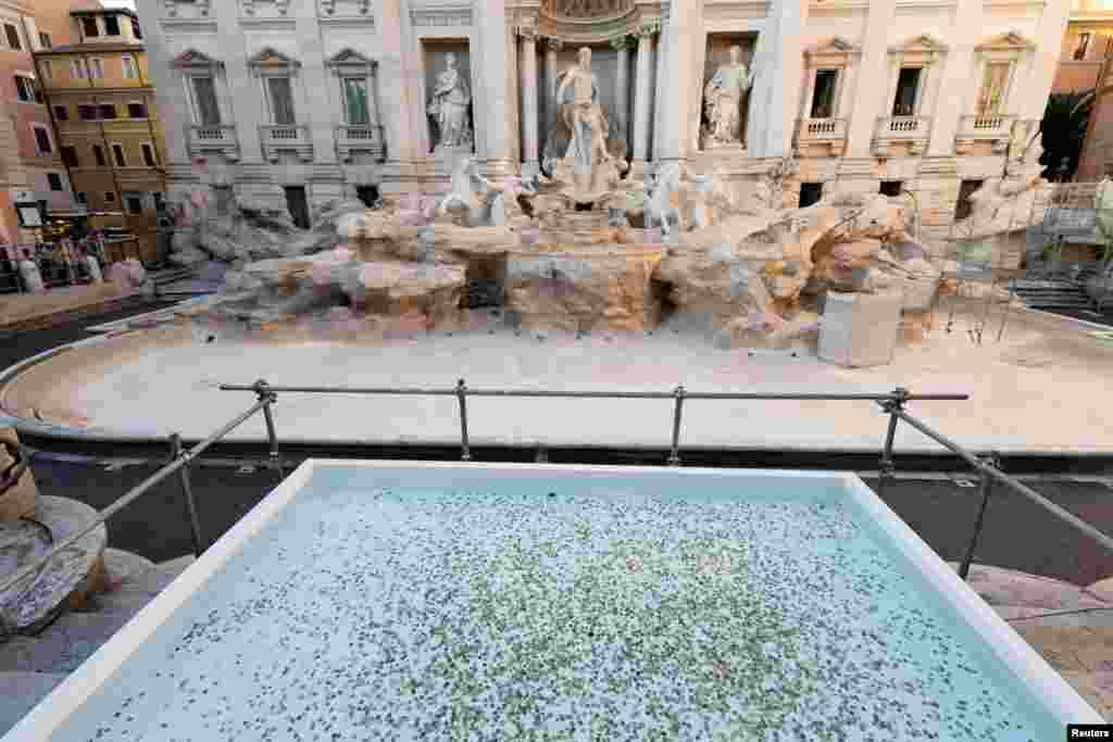 A pool was created to collect tourists&#39; coins and wishes as the Trevi fountain undergoes maintenance works in Rome, Oct. 31, 2024
