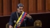 Venezuelan President Nicolas Maduro delivers a speech before the judges of the Supreme Court of Justice during the opening ceremony of the judicial year in Caracas on January 31, 2024. (Photo by Pedro Rances Mattey / AFP)