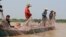 Villagers are net fishing in the Tonle Sap Lake, in Kampong Chhnang province, Cambodia, on March 12, 2020. (Sun Narin/VOA Khmer) 