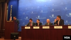 何志平在美国传统基金会举办的座谈会上讲话。（2015年12月9日）