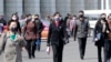 Pedestrians wear face masks to help prevent the spread of the coronavirus, Wednesday, April 1, 2020, in Pyongyang, North Korea. The new coronavirus causes mild or moderate symptoms for most people, but for some, especially older adults and people…