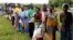 Malawians queue for food aid distributed by the United Nations World Food Program (WFP) in Mzumazi village near the capital Lilongwe, Feb. 3, 2016. 