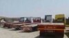 In this screen grab of a video verified by VOA Persian, trucks sit idle in the western Iranian city of Kangavar, May 29, 2018, as drivers participate in a nationwide truckers’ strike that began May 22.