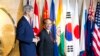 Secretary of State John Kerry, left, walks with Secretary-General of Association of Southeast Asian Nations (ASEAN), Le Luong Minh to their meeting on Sunday, Feb. 16, 2014, in Jakarta, Indonesia.