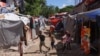 Haitians displaced by gang violence take shelter in refugee camp, in Port-au-Prince