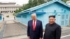 FILE - U.S. President Donald Trump meets with North Korean leader Kim Jong Un at the demilitarized zone separating the two Koreas, in Panmunjom, South Korea, June 30, 2019. 
