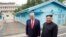 FILE - U.S. President Donald Trump meets with North Korean leader Kim Jong Un at the demilitarized zone separating the two Koreas, in Panmunjom, South Korea, June 30, 2019. 