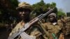 A picture taken on January 10, 2013 shows Seleka rebel coalition members take up positions in a village 12 kilometers from Damara.