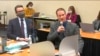 In this image from video, defense attorney Eric Nelson, left, and defendant Derek Chauvin address Hennepin County Judge Peter Cahill during motions before the court, April 15, 2021, in Chauvin's trial in Minneapolis.