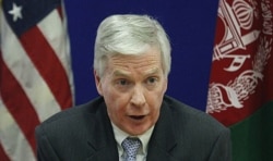 FILE - Then-U.S. Ambassador to Afghanistan Ryan Crocker speaks during a press conference at the U.S. Embassy in Kabul, Dec. 10, 2011.