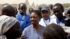 United Nations Under-Secretary-General for Humanitarian Affairs and Emergency Relief Coordinator for South Sudan, Valerie Amos, engages with local government officials and humanitarian aid workers in the village of Walgak, South Sudan on Thursday, Feb. 2,