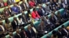 FILE - Ugandan lawmakers are seen gathered in parliament, in Kampala, Uganda, Sept. 21, 2017.